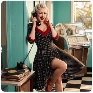 Vintage pinky pinups swing dress polkadot with bows small Euc